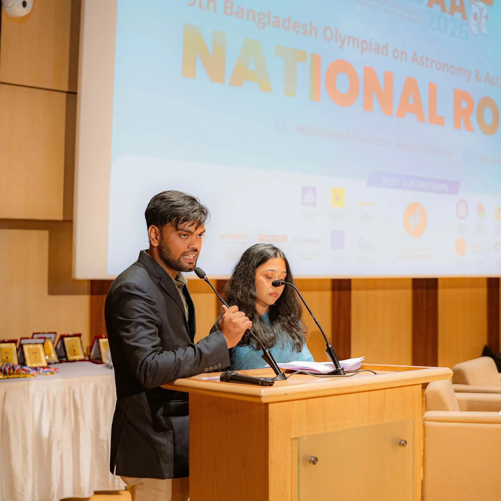 The anchors welcoming guests to the Closing Ceremony of the 9th BDOAA National Round.