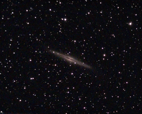 an image ngc891 in the starry sky captured by an astrophotographer with telescope