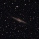 an image ngc891 in the starry sky captured by an astrophotographer with telescope